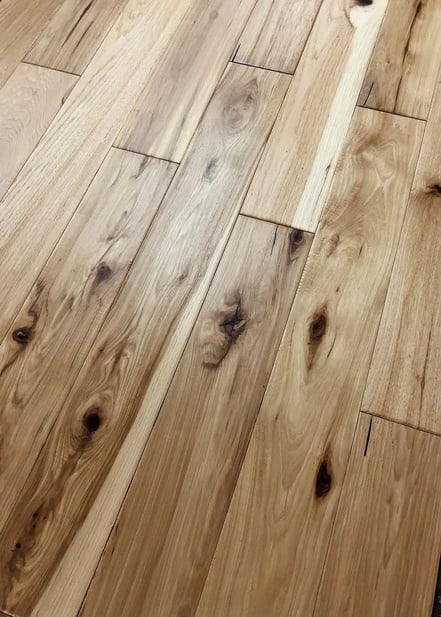 a close-up view of a hardwood floor installed by Guerrero & Sons Construction